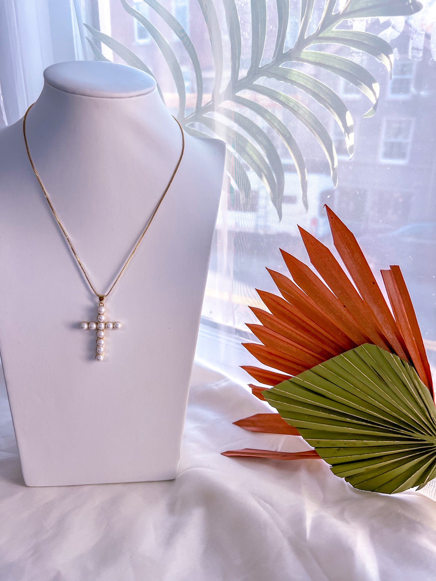 The Pearls Cross