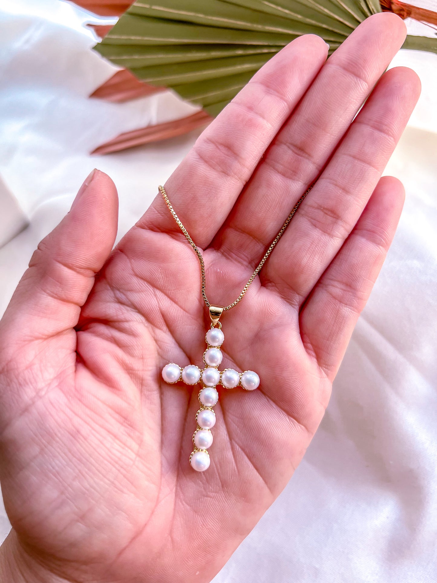 The Pearls Cross